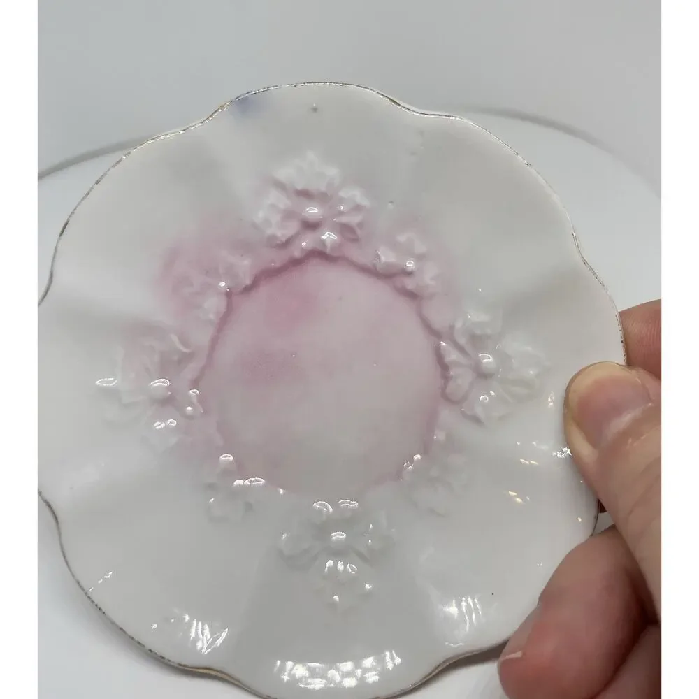 Antique Footed Teacup And Saucer